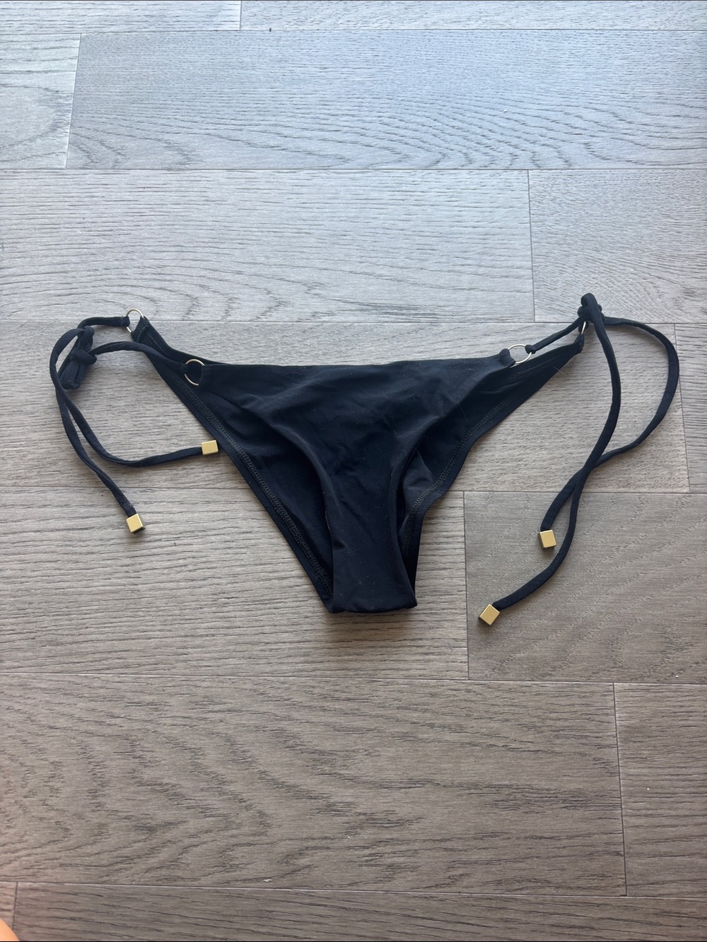 Vitamin A Black Tie-Side Bikini Bottom with Gold Accents